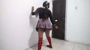 The busty student dances sexily in her apartment. She's an 18-year-old brunette.