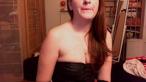 nicoletta, a 40-year-old woman with a passion for collecting and wearing black latex gloves in the privacy of her room