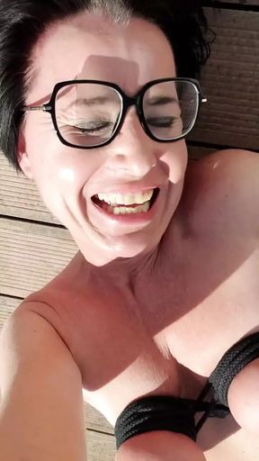 Milf Julie squirts on flat roof