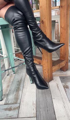 MILF in thigh-high boots caught teasing in public