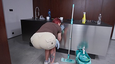Voluptuous Redhead Cleans a Black Dick