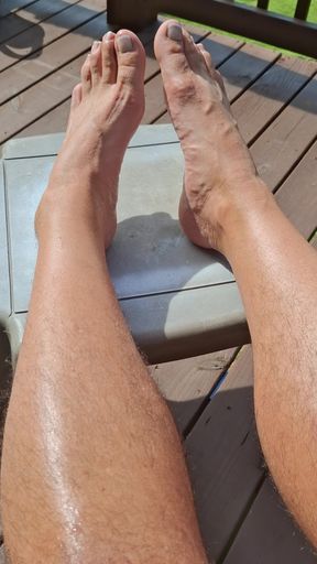 My pedicured feet and hairy legs