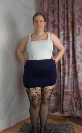 Mini skirt heels and fishnet stockings