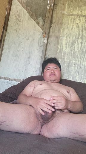Masturbating