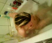Brunette wife takes bath all naked and shaved her snapper
