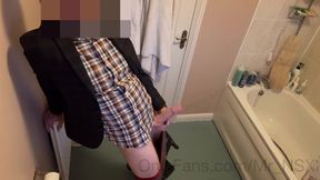 Suit-clad stud jerks big uncut cock to cumshot
