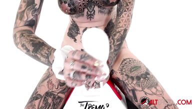 Blonde Aussie with tattoos tremors while she fucks herself with a toy