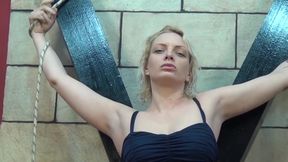 Blindfolded blonde gets punishment