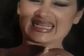 Two stunning lesbian babes pleasuring each other with a dildo