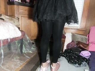 Cute T-angel in frilly suit and ebony tights showing off her toenail polish