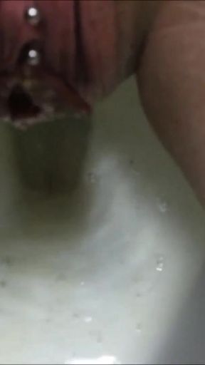 My Shaved Pierced Pussy Peeing   Clip 1
