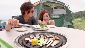 Asian couple having some freaky outdoor sex