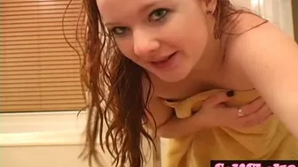 Petite teen plays with herself in the shower