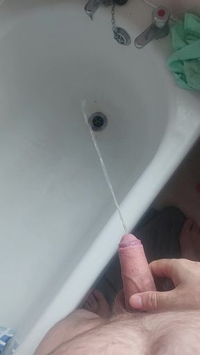 Cute teen pees in public park