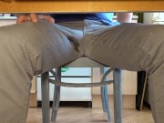 Pissing in jeans under the table