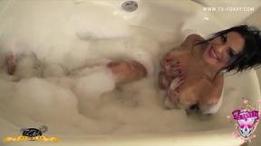 ”TS Foxxy Cleaning Prick in a Bubble Bath Makes Her Horny”