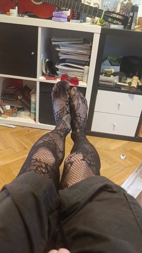 Cute feet in fishnets