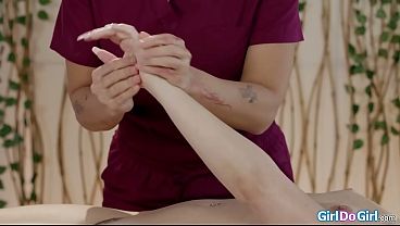 Masseuse helps client get ready for anal