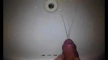 Uncut hard cock pee piss pissing