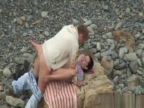 Kinky amateur couple having hardcore sex on the beach