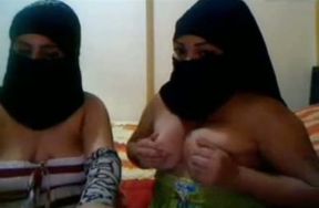 Two naughty Arab chicks flashing their tits on webcam