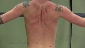 Tattooed Cora bare back whip