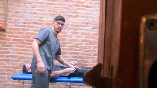 The male nurse gives him a massage and a handjob too