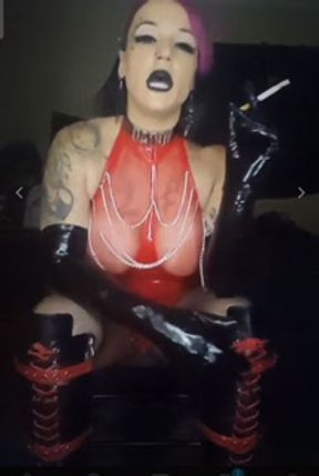 Naughty latex slut KandyxB smoking Marlboro Red 100s