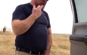 Taking a leak in the country.