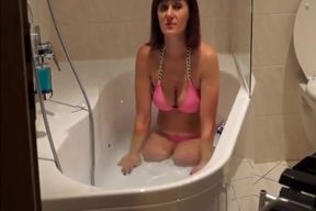 Dak Amputee Woman Having A Bath At Home