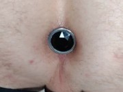 Playing with butt plug.