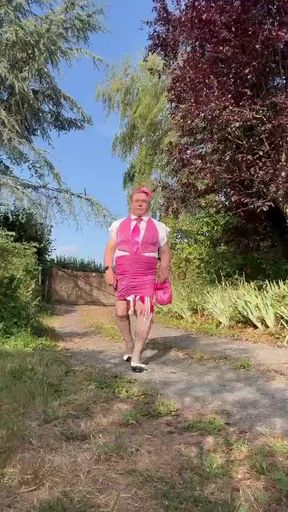 Dressed in a tight pink dress for an evening out