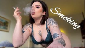 Sexy smoking alternative tattooed model in lingerie