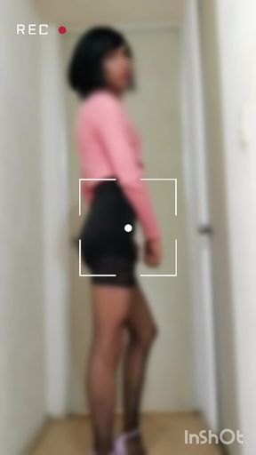 Transvestite in skirt and stockings