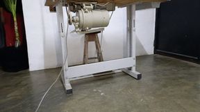 While the man repairs my cooking machine I use my bare feet to pump the pedal of this machine (4)