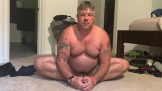 Naked dad bod stretching