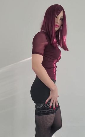Crossdresser in Sexy Miniskirt and High Heels