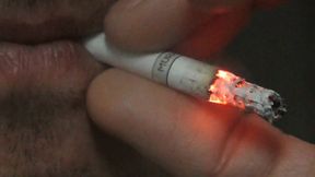 Smoking Muratti red 100s closeup IYF 051224