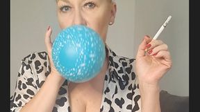 Smoker stepmom blow up the balloons for your birthday party with lots of Marlboro Red 100 cigarette smoke