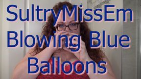 Blowing blue balloons