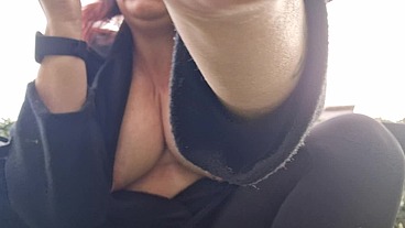 Beautiful italian milf shows you boobs while smoking in the garden