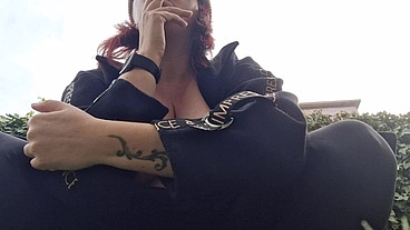 Beautiful italian milf shows you boobs while smoking in the garden
