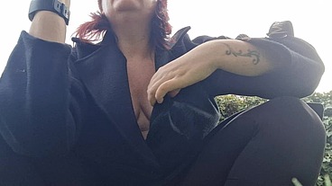 Beautiful italian milf shows you boobs while smoking in the garden