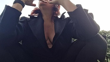 Beautiful italian milf shows you boobs while smoking in the garden