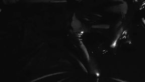 Bound in latex, he takes control