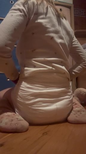 Messy diaper play with a wet princess