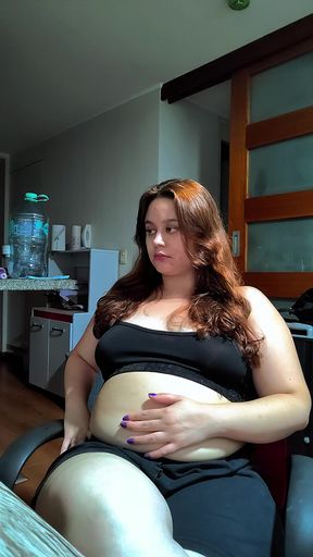 Hot Chubby Woman Filling Her Round Belly with Some Sweets