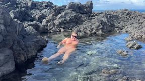 Nudist Girl Swimming Naked in the Natural Pool Outdoor