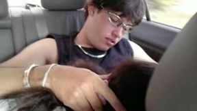 This nerdy dude loves receiving oral sex in the car