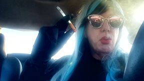 MATURE CD SMOKING &amp; DRIVING WITH A MB100 CIGARETTE IN HER GLOVED HAND